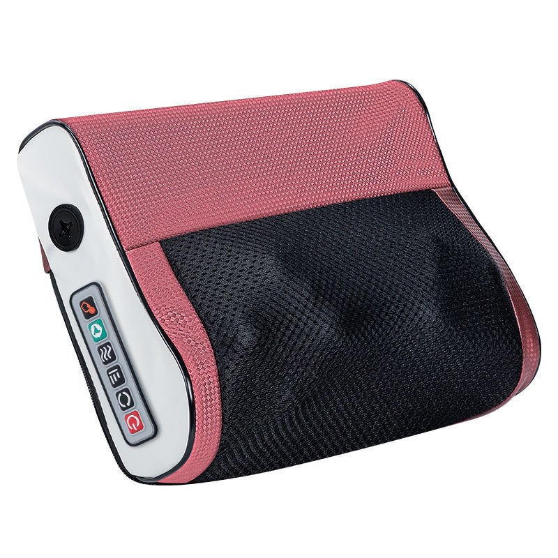 Woman relaxing in a chair using an electric lumbar massage cushion with heat for lower back pain relief and ergonomic comfort at home.